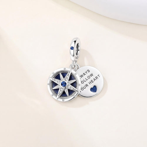 Compass Heart Dangle Charm in 925 sterling silver with blue enamel and sparkling stones, fits European-style charm bracelets