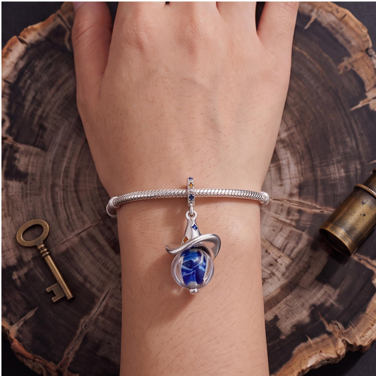 Wizard Hat Orb Charm close-up on a bracelet
