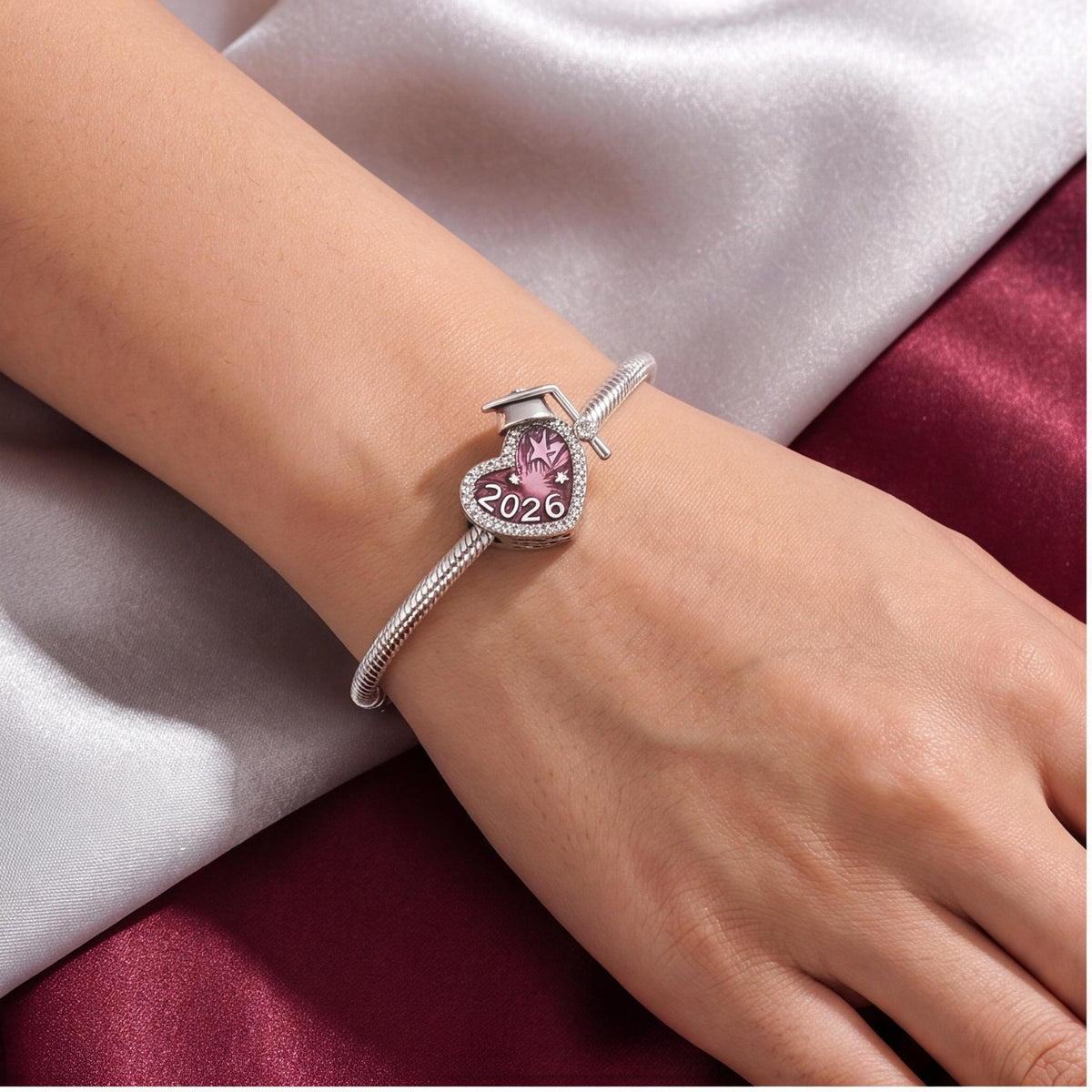 2026 Graduation Charm close-up on a bracelet
