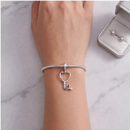 Stethoscope Heart Dangle worn on a charm bracelet