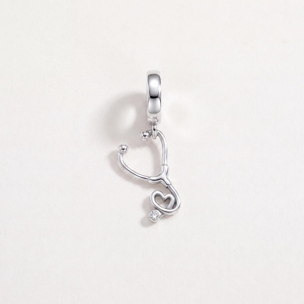 Stethoscope Heart Dangle in 925 sterling silver with sparkling stones, fits European-style charm bracelets
