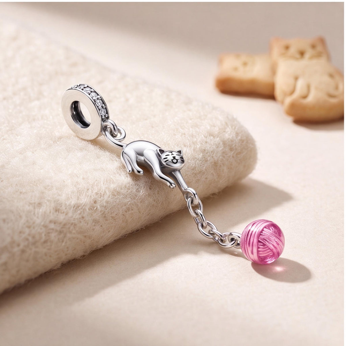 Playful Cat Yarn Charm styled as a gift