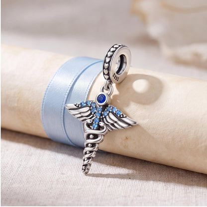 Medical Caduceus Dangle Charm on a silver charm bracelet