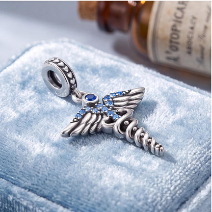 Medical Caduceus Dangle Charm styled as a gift