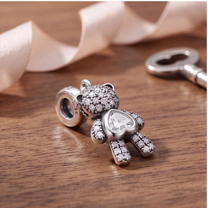Teddy Bear Heart Dangle styled as a gift