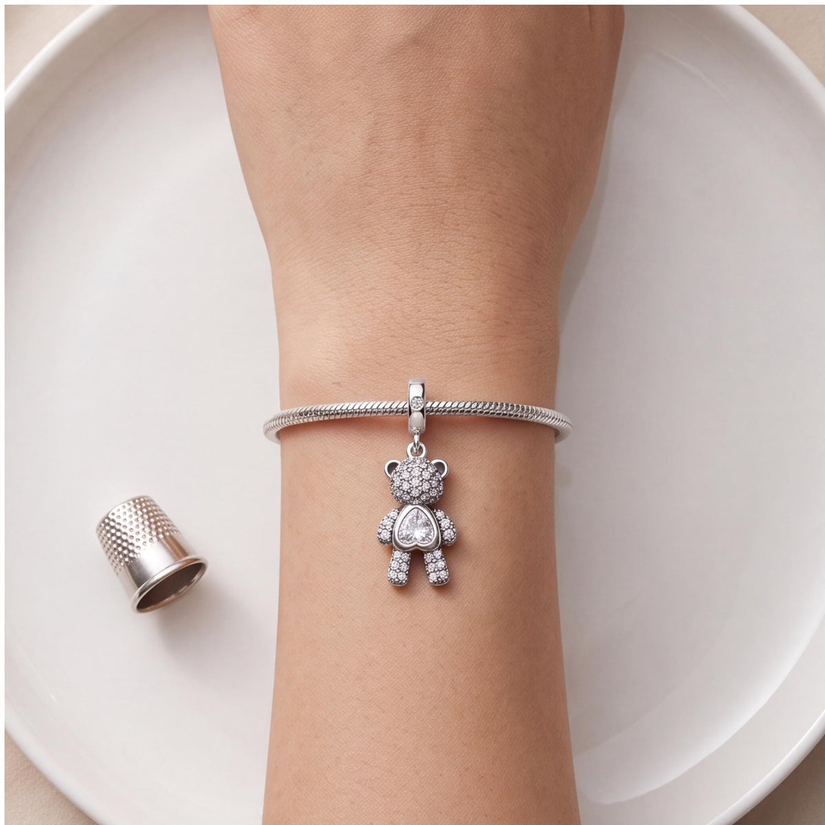 Teddy Bear Heart Dangle worn on a charm bracelet