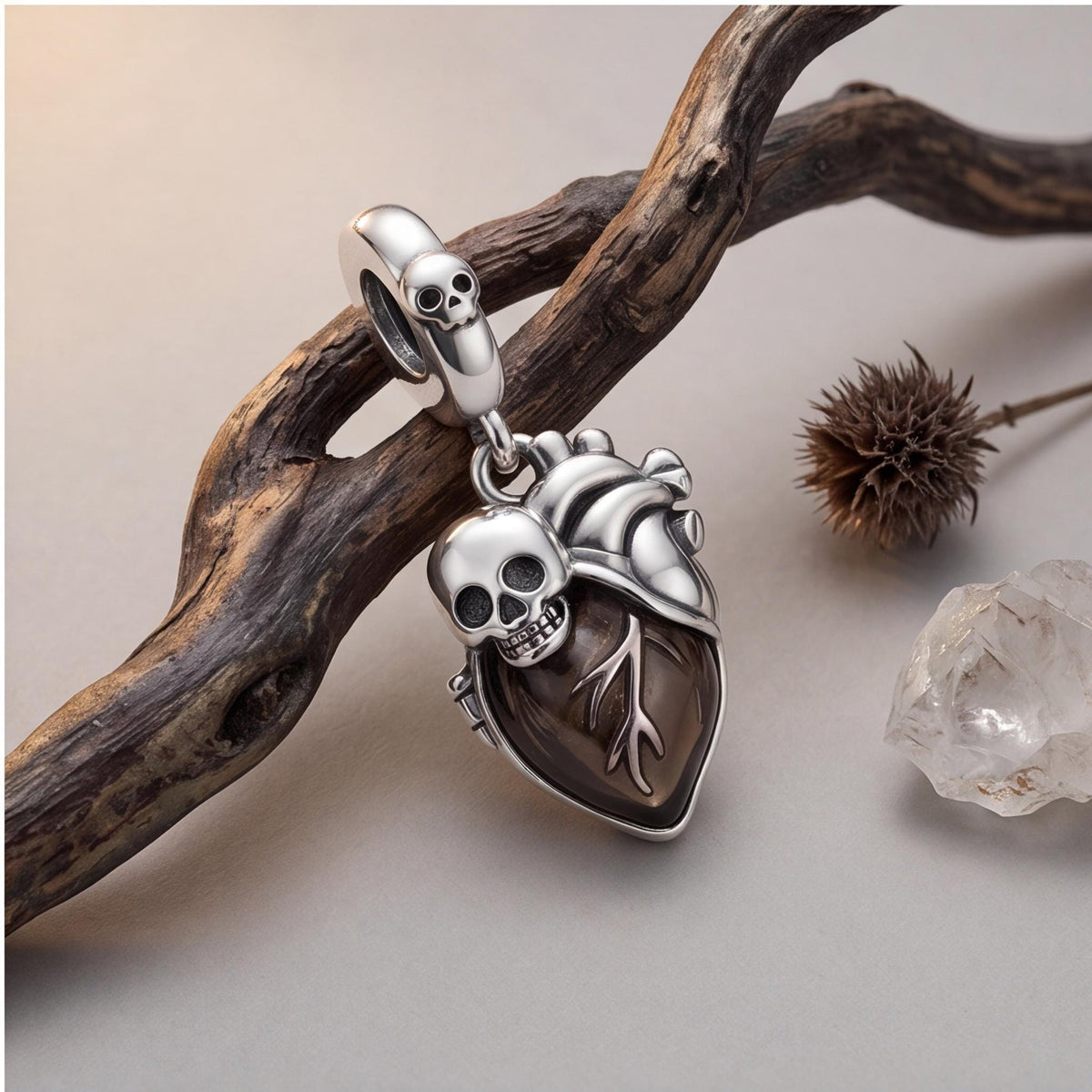 Skull Heart Dangle worn on a charm bracelet