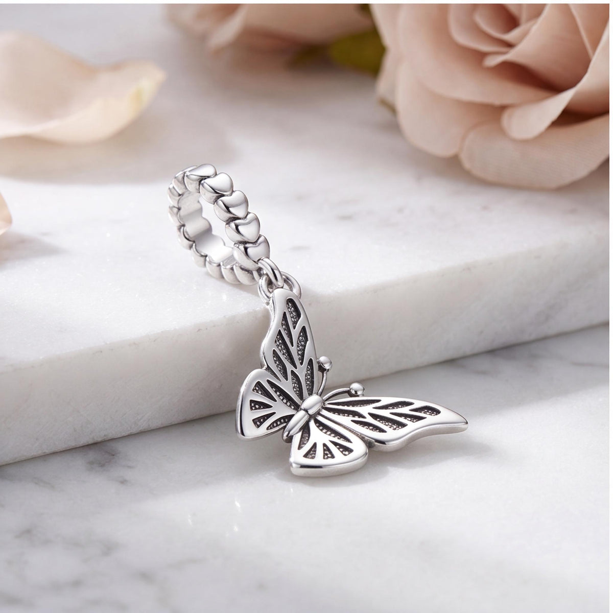 Butterfly Dangle Charm on a silver charm bracelet