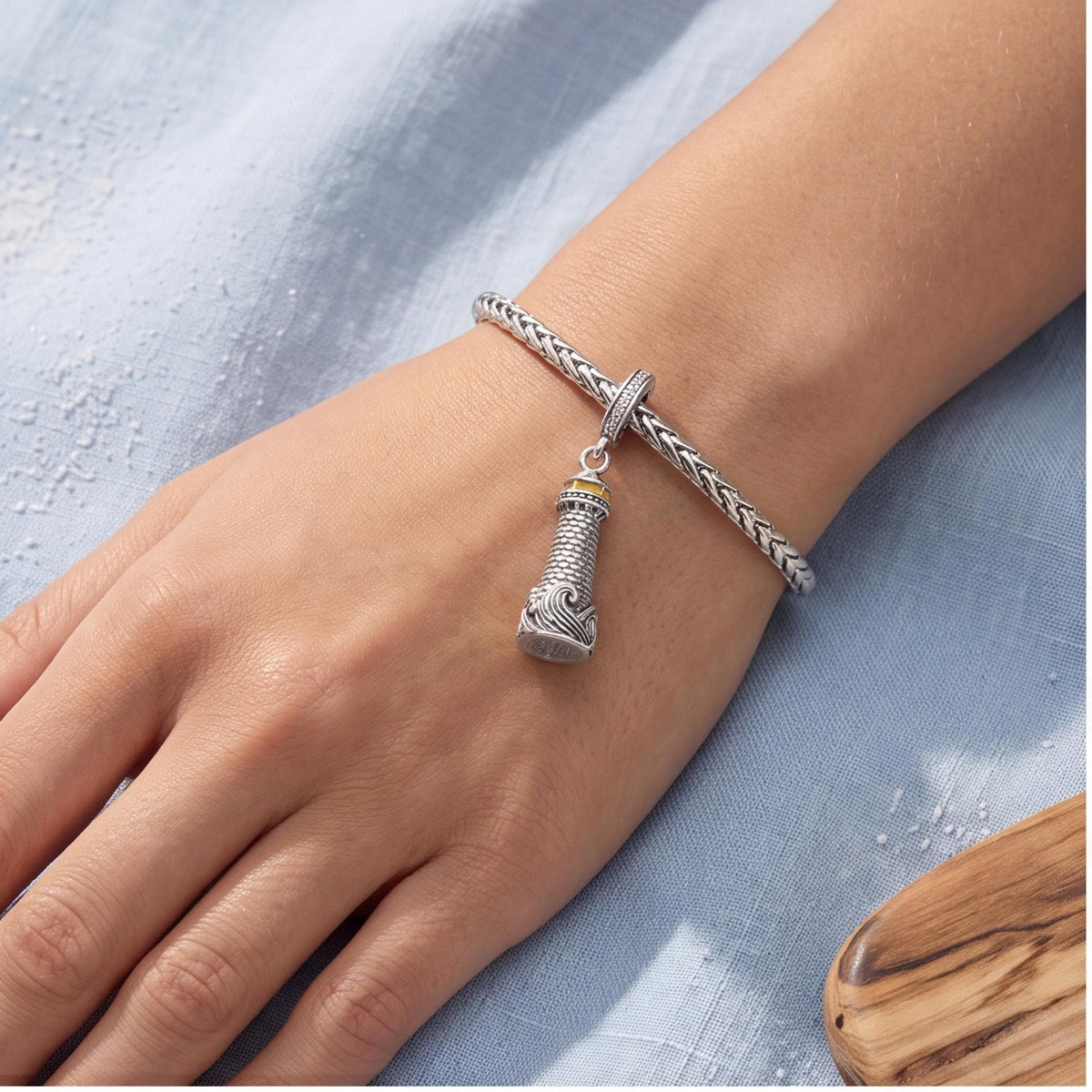 Lighthouse Dangle Charm styled as a gift
