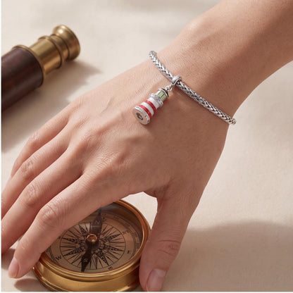 Red Enamel Lighthouse Dangle worn on a charm bracelet