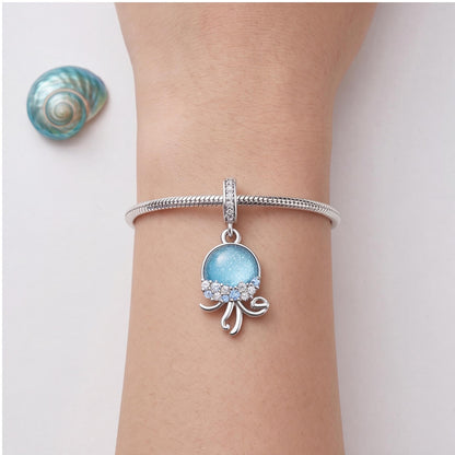 Jellyfish Dangle Charm worn on a charm bracelet
