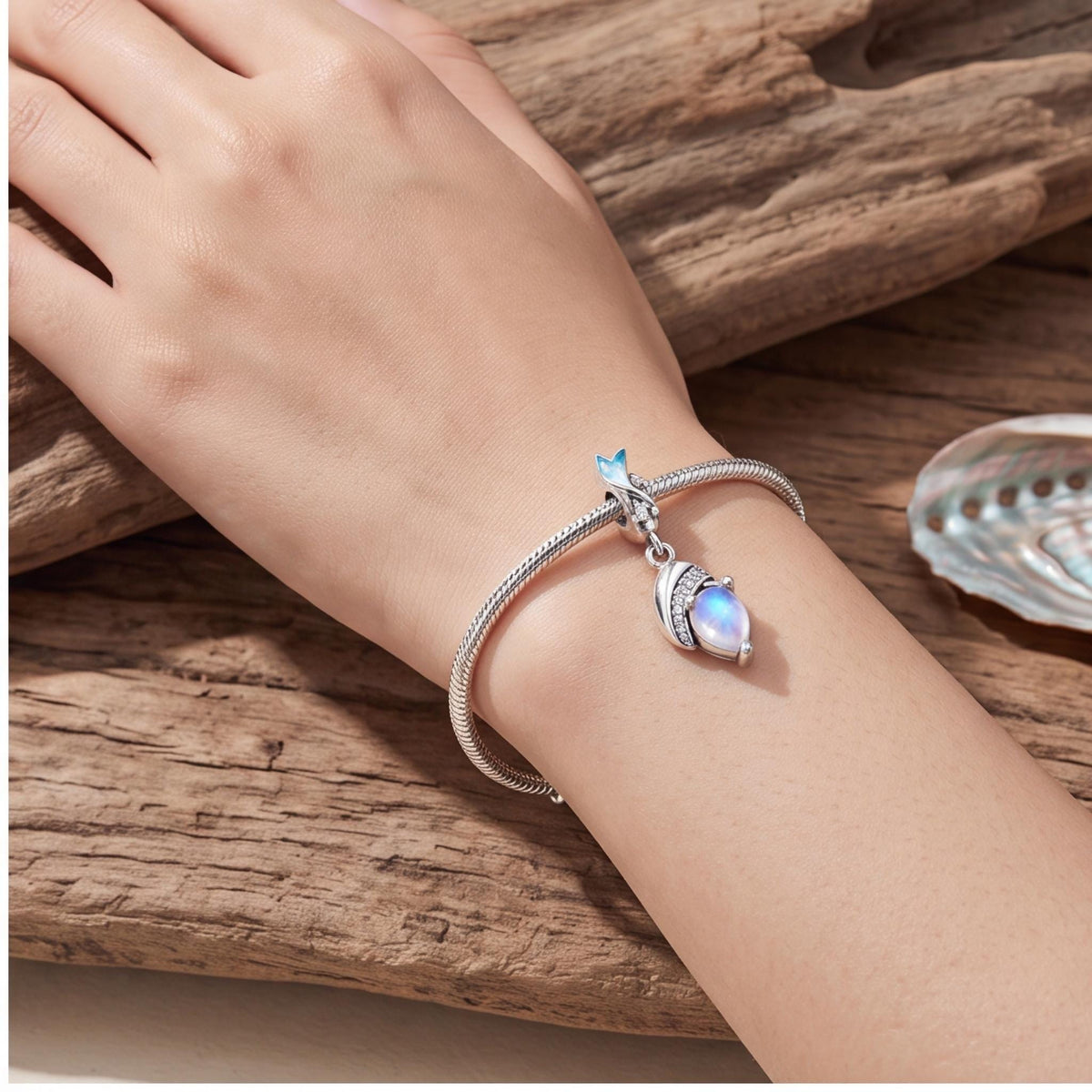 Moonstone Leaf Dangle close-up on a bracelet
