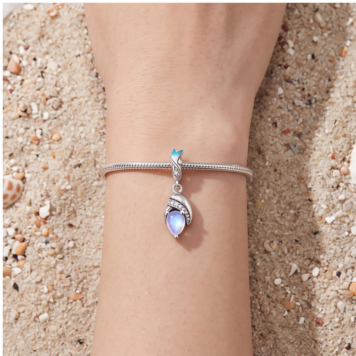 Moonstone Leaf Dangle worn on a charm bracelet
