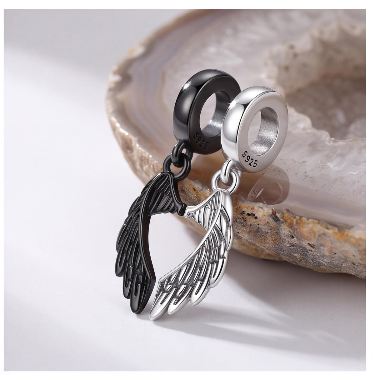 Angel Wing Dangle Charm on a silver charm bracelet