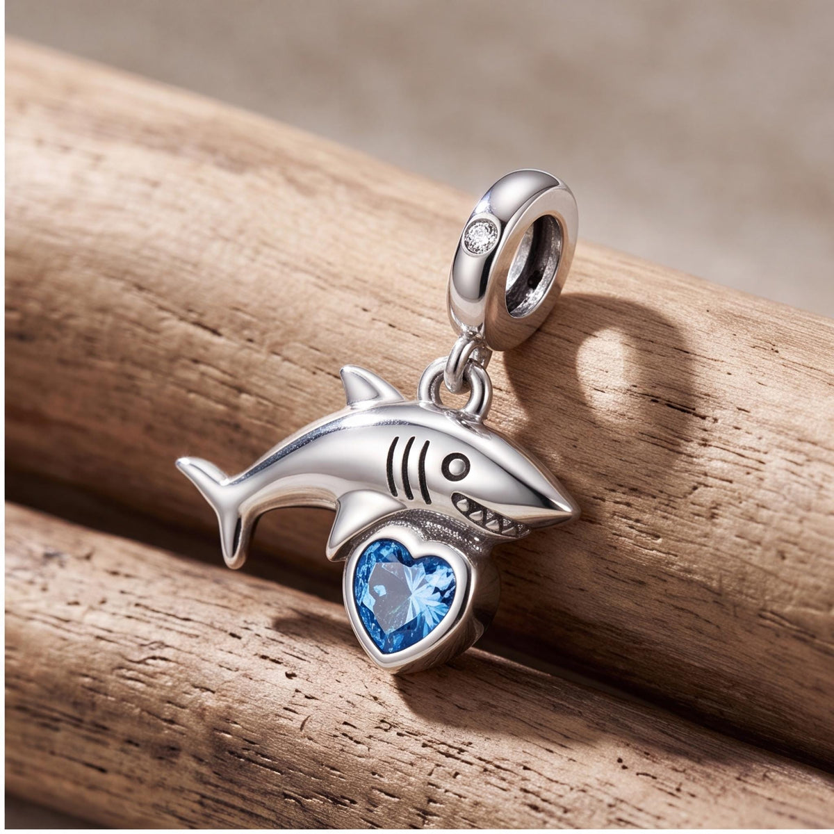 Shark Heart Charm on a bracelet with other charms