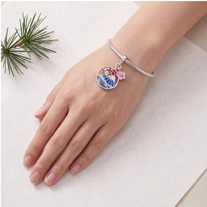 Mount Fuji Cherry Blossom Dangle worn on a charm bracelet