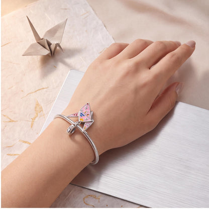 Origami Crane Dangle styled as a gift
