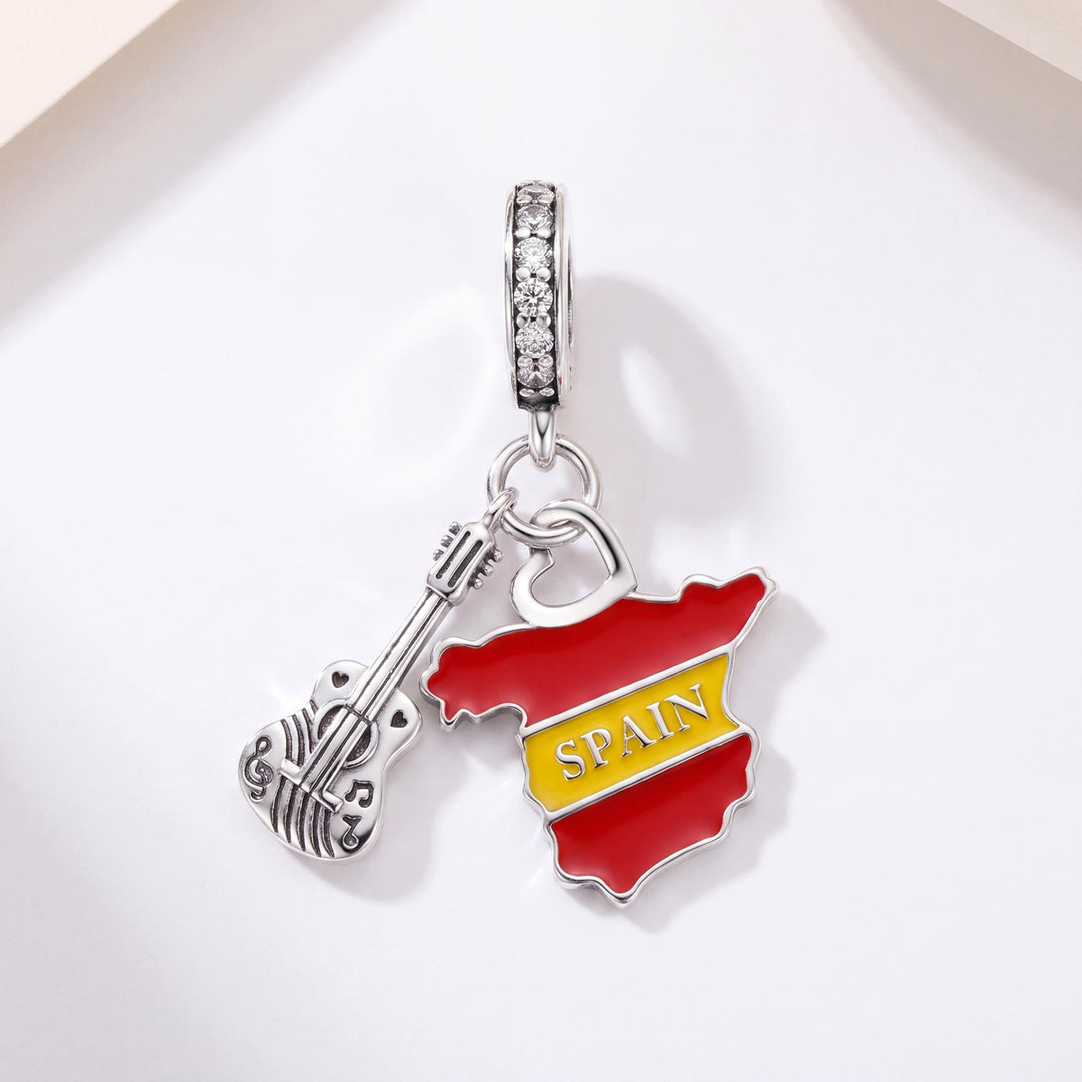 Spain Map Guitar Dangle in 925 sterling silver with red and yellow enamel and sparkling stones