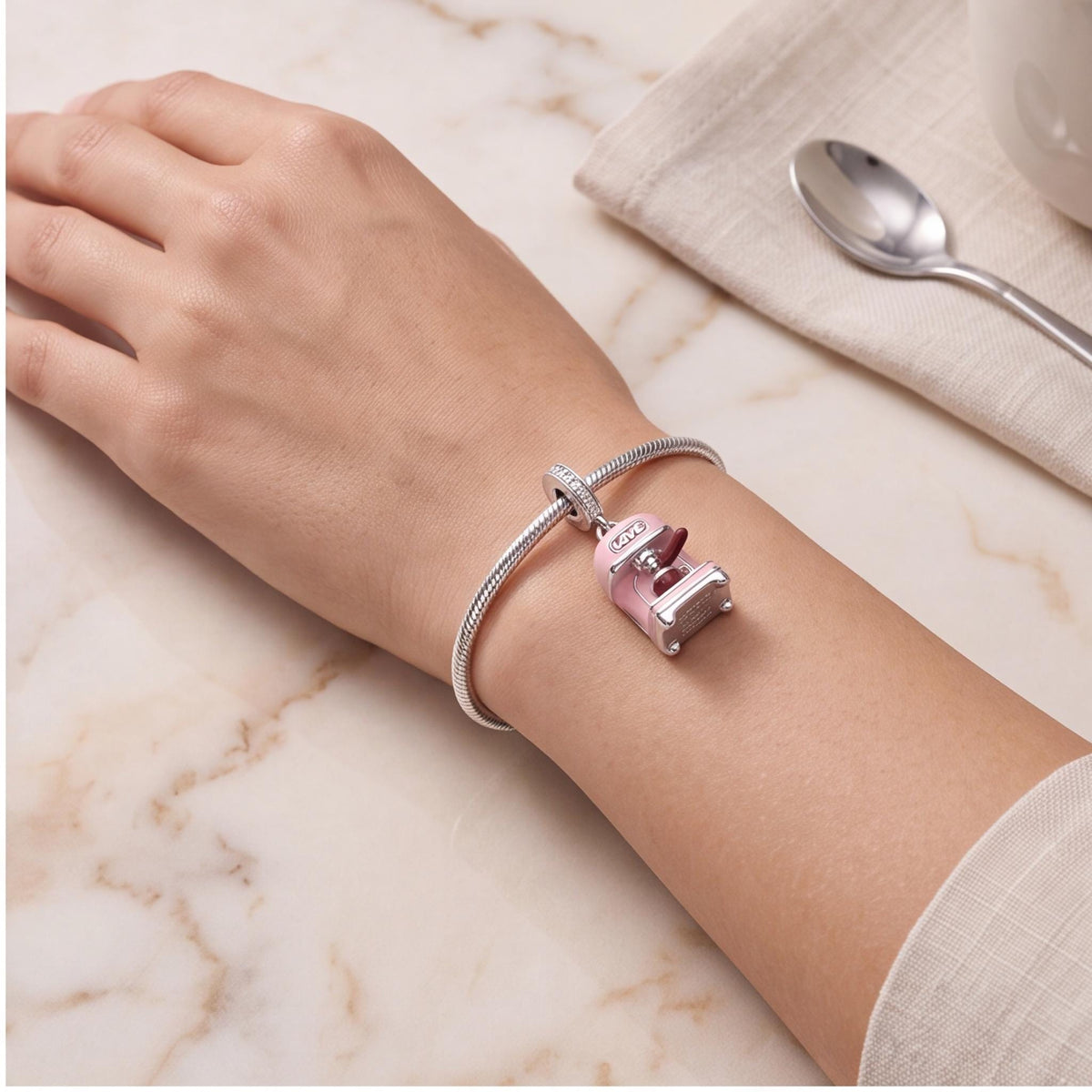 Coffee Machine Charm worn on a charm bracelet