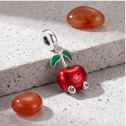 Smiley Apple Dangle Charm styled as a gift