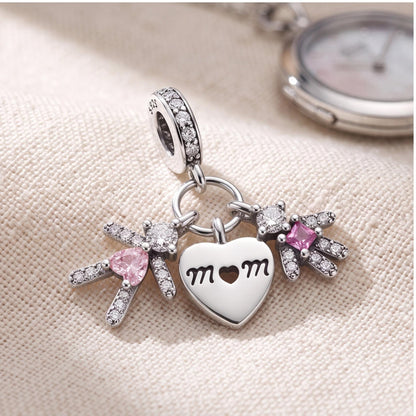 Mom Heart Kids Dangle Charm on a silver charm bracelet