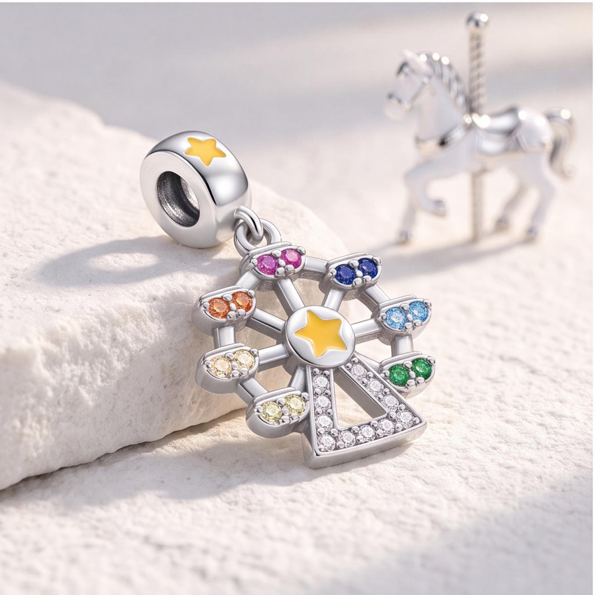 Rainbow Ferris Wheel Dangle on a silver charm bracelet