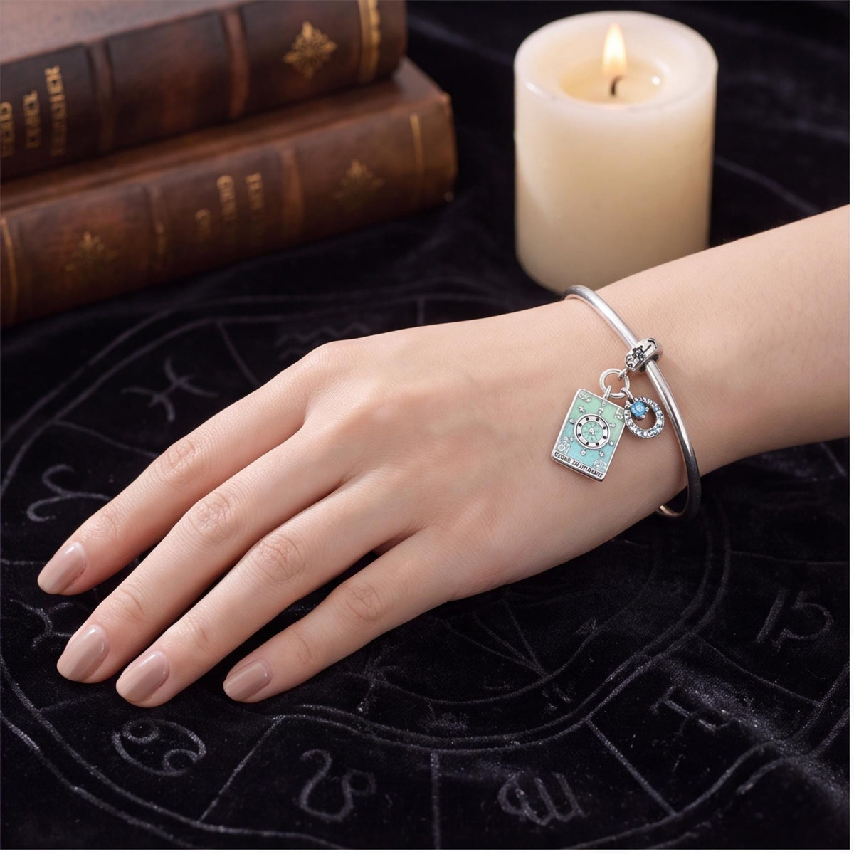 Wheel of Fortune Charm close-up on a bracelet