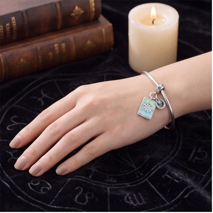 Wheel of Fortune Charm close-up on a bracelet