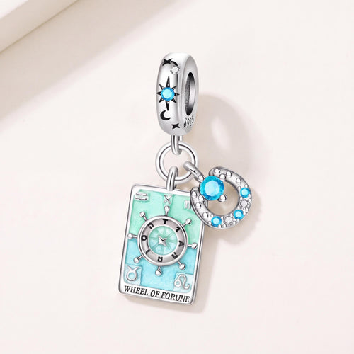 Wheel of Fortune Charm in 925 sterling silver with blue and green enamel and sparkling stones