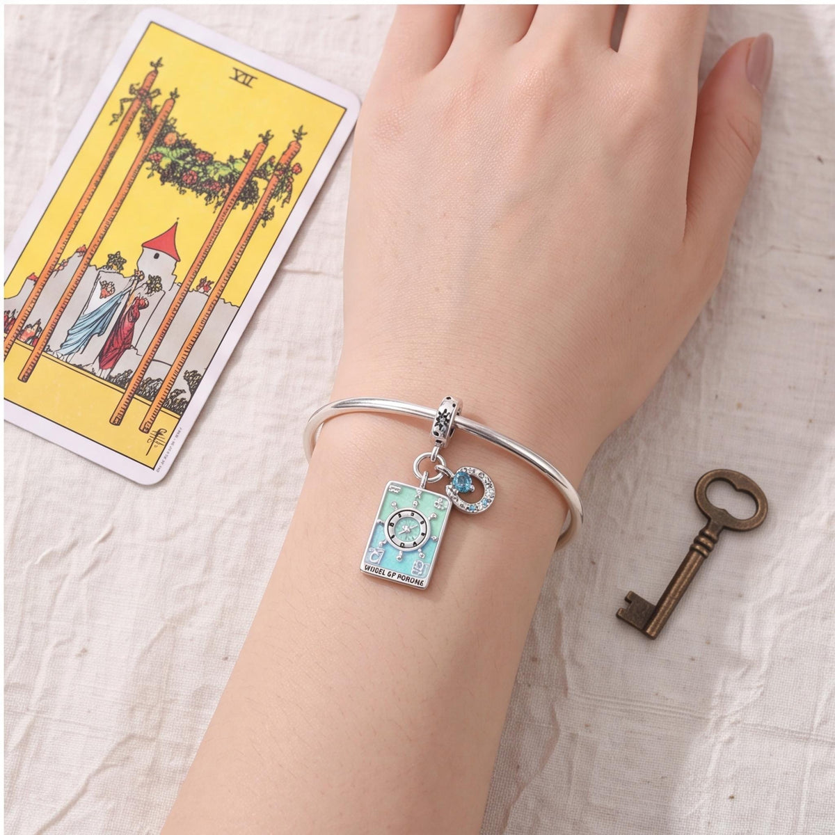 Wheel of Fortune Charm worn on a charm bracelet