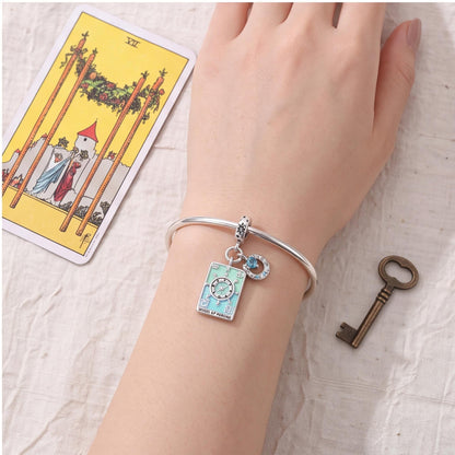 Wheel of Fortune Charm worn on a charm bracelet