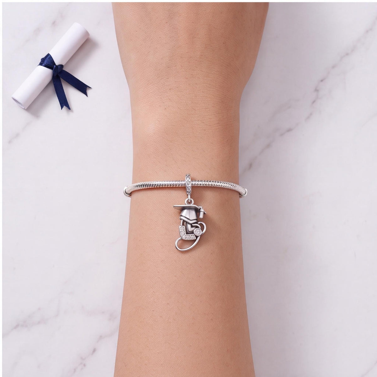 Graduation Cap Heart Dangle worn on a charm bracelet