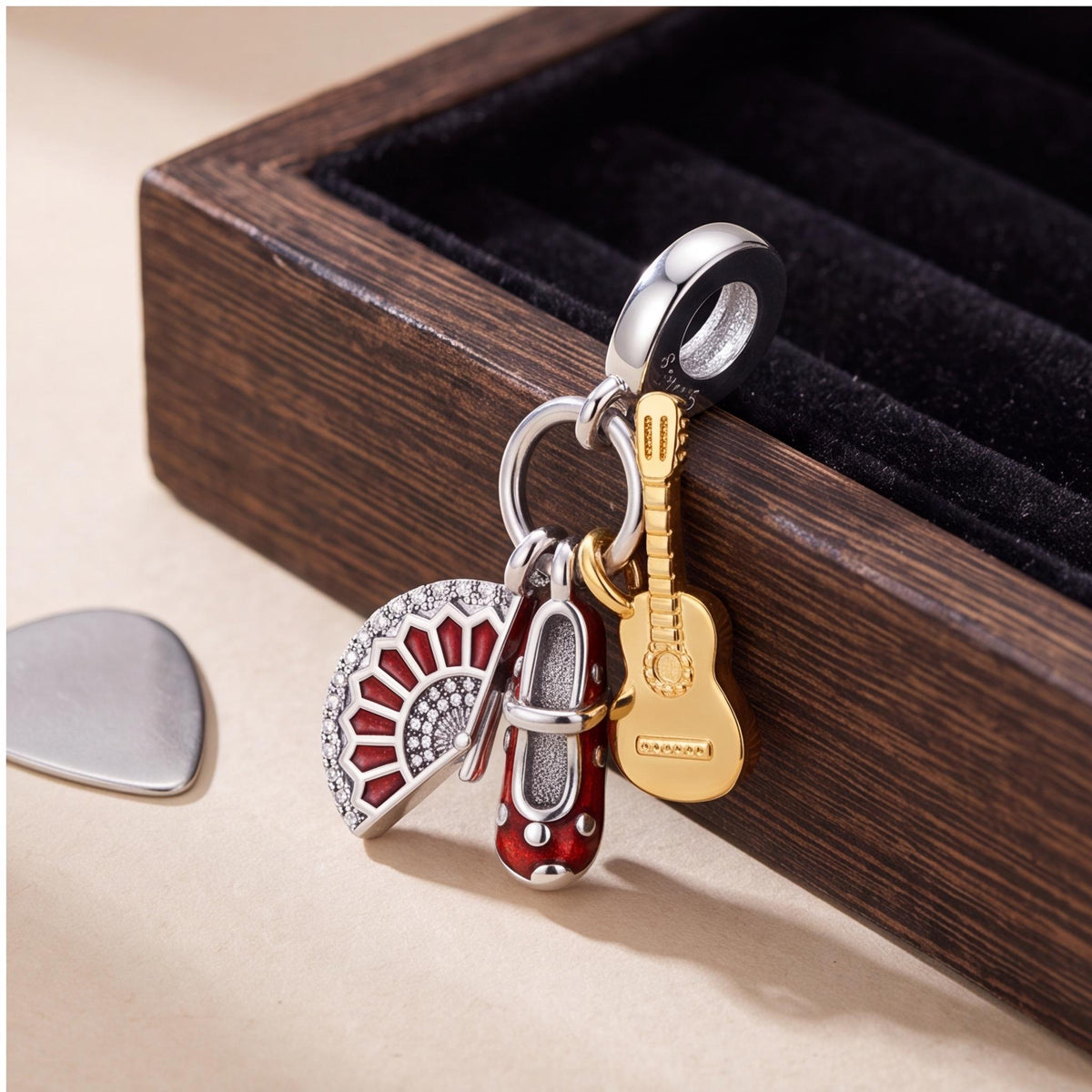 Flamenco Dangle Charm on a silver charm bracelet