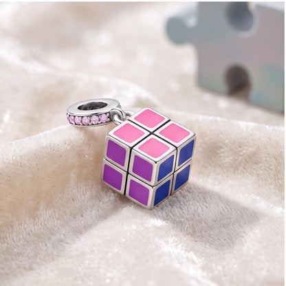 Puzzle Cube Dangle Charm worn on a charm bracelet