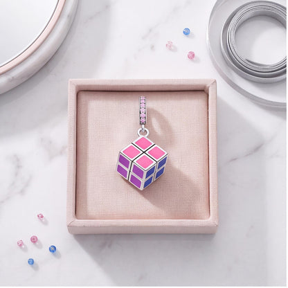 Puzzle Cube Dangle Charm on a silver charm bracelet