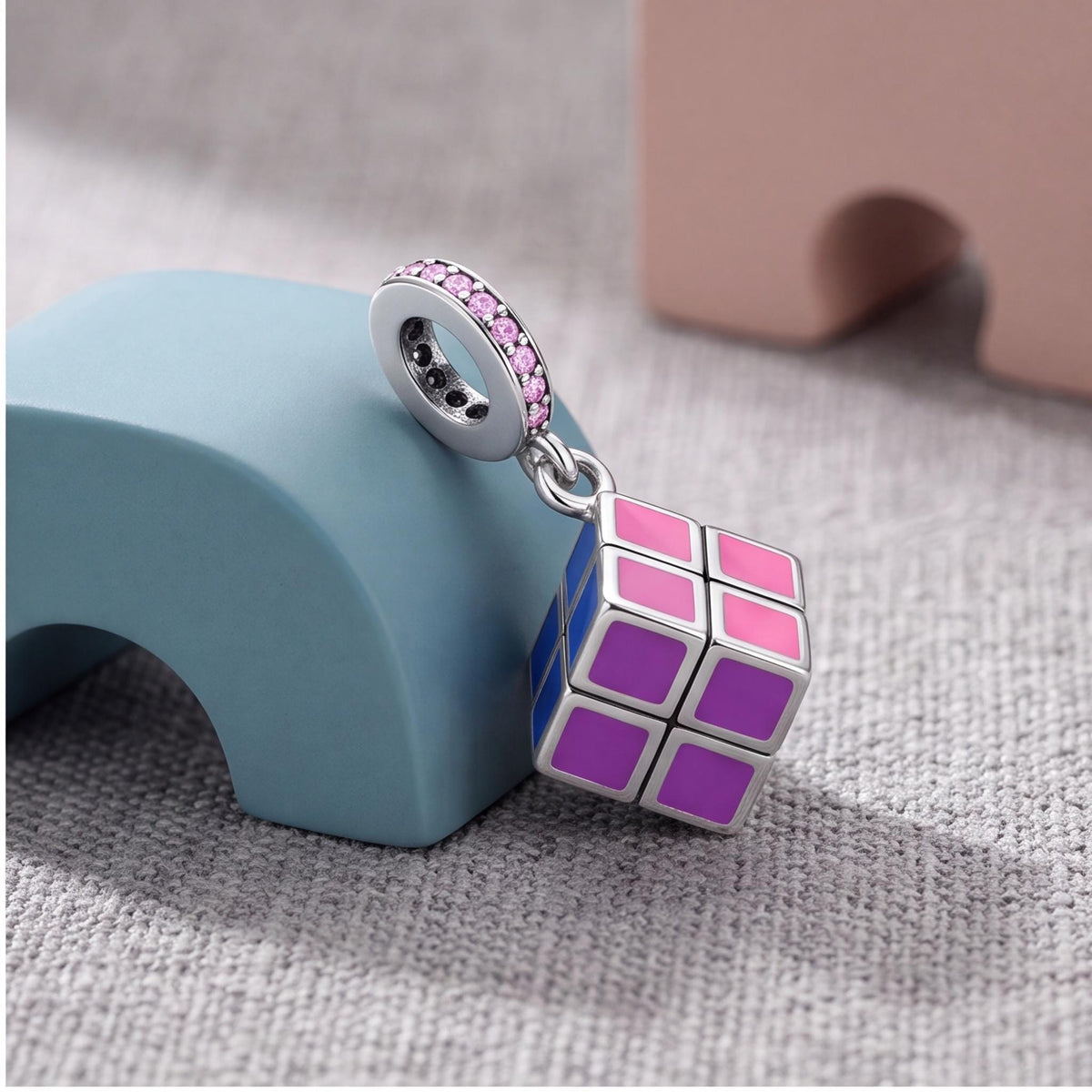 Puzzle Cube Dangle Charm close-up on a bracelet