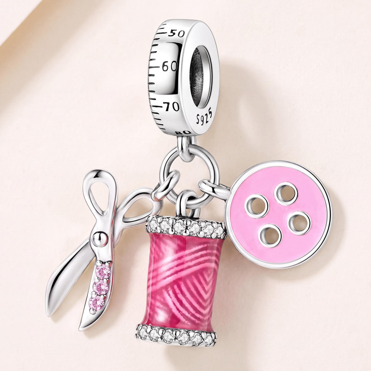 Sewing Dangle Charm in 925 sterling silver with pink enamel and sparkling stones, fits European-style charm bracelets