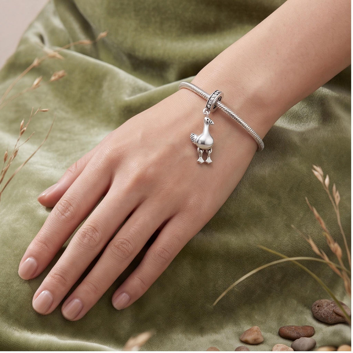Dodo Bird Dangle Charm close-up on a bracelet