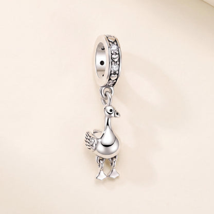 Dodo Bird Dangle Charm in 925 sterling silver with sparkling stones, fits European-style charm bracelets