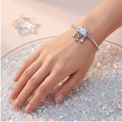 Moon Cloud Charm close-up on a bracelet