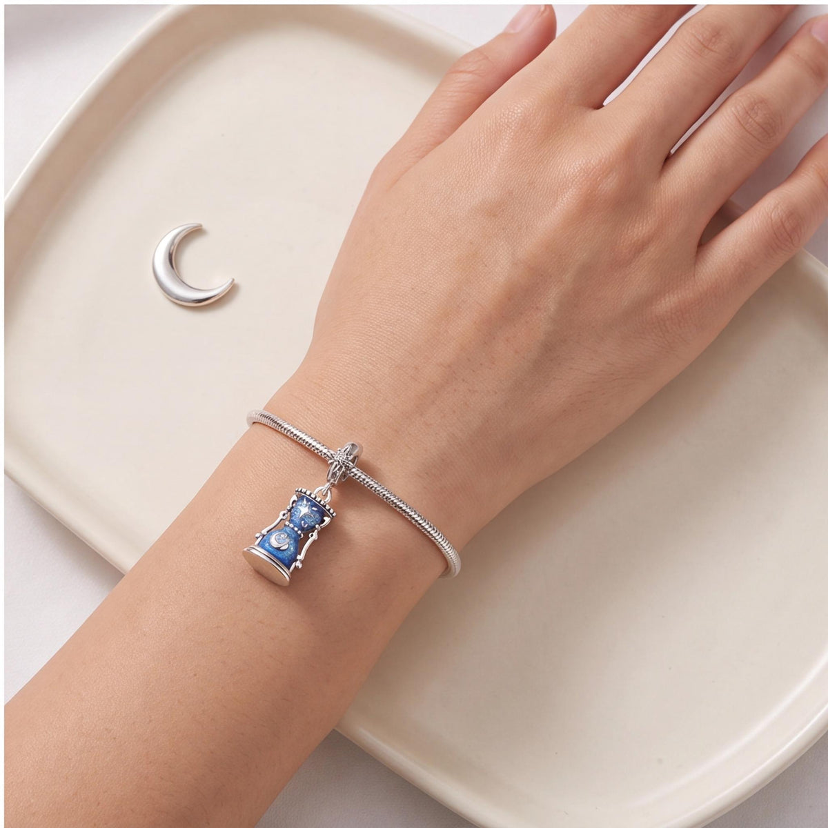 Celestial Hourglass Dangle styled as a gift