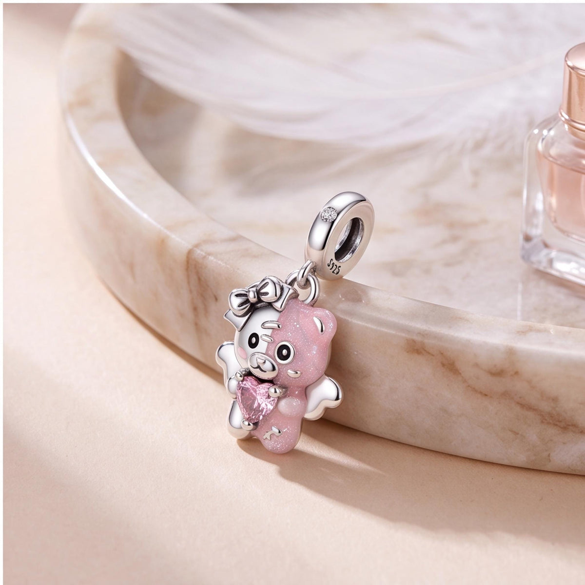 Angel Bear Charm worn on a charm bracelet