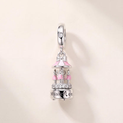 Carousel Music Box Dangle in 925 sterling silver with pink enamel and sparkling stones, fits European-style charm bracelets