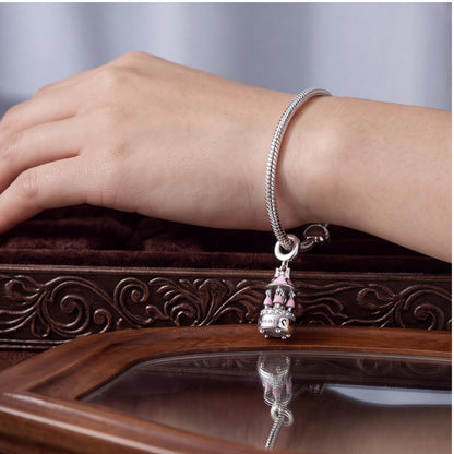 Carousel Music Box Dangle worn on a charm bracelet