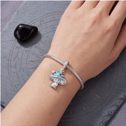 Witch Cat Dangle Charm worn on a charm bracelet