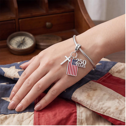 USA Flag Dangle Charm worn on a charm bracelet