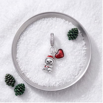 Snowman Heart Dangle styled as a gift