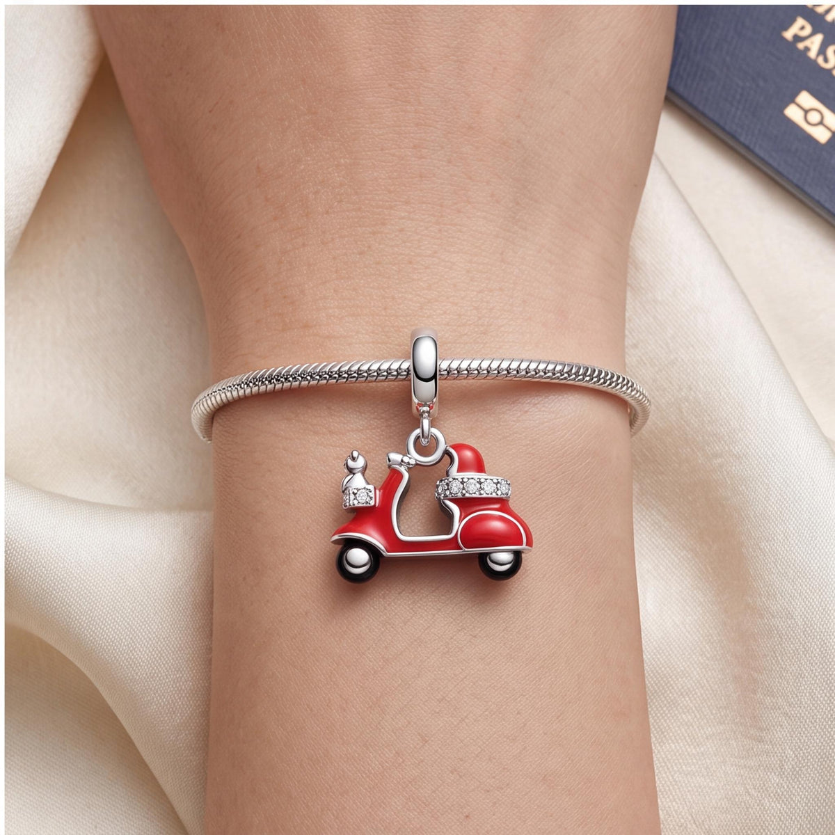 Red Scooter Dangle worn on a charm bracelet
