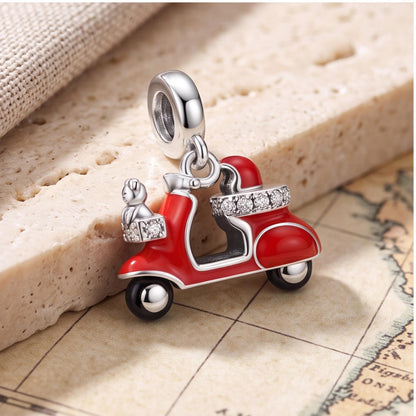 Red Scooter Dangle on a silver charm bracelet
