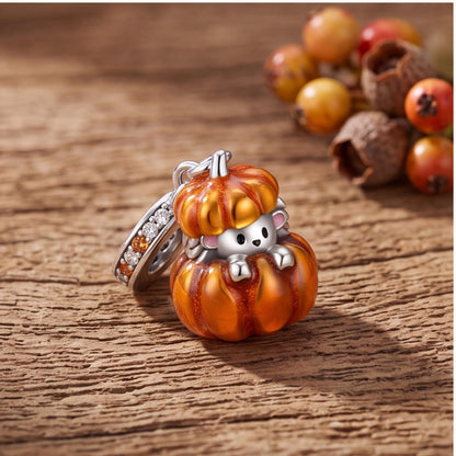 Pumpkin Hedgehog Charm on a silver charm bracelet